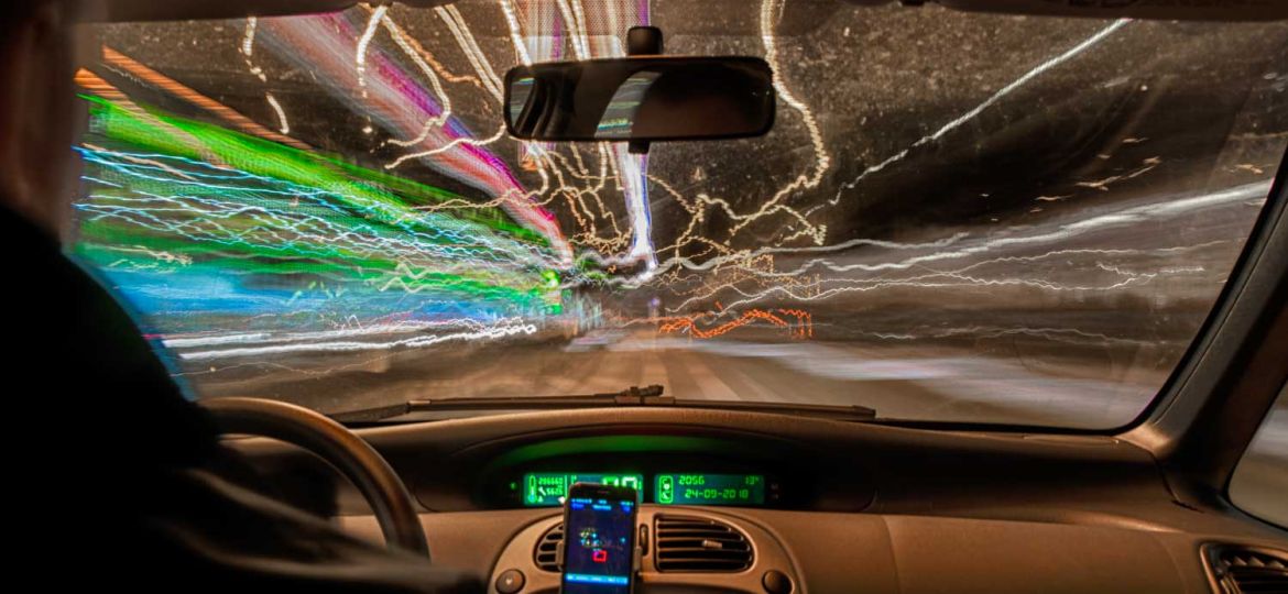Lange sluitertijd in rijdende auto