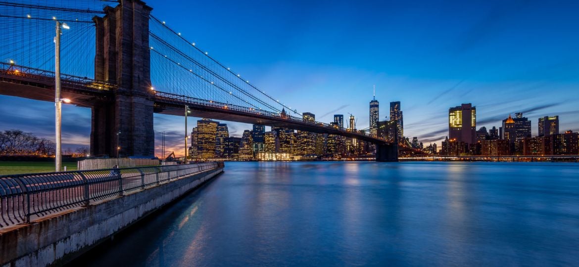 Skyline New York by Night from Brooklyn Bridge