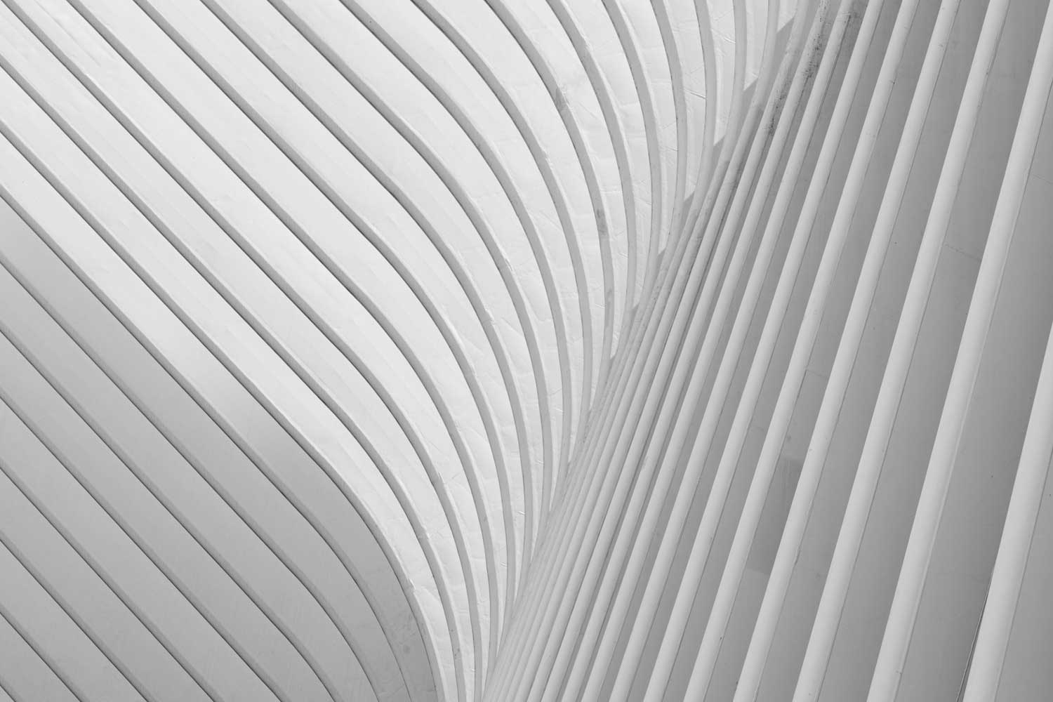 Het belang van inzoomen op abstracte patronen, texturen en minimalistische details van gebouwen.